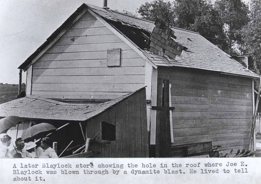 A later Blaylock store showing the hole in the roof where Joe E. Blaylock was blown through by a dynamite blast. He lived to tell about it.