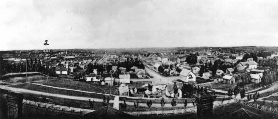 Panoramic looking west and northwest from the Courthouse before 1906. No. 1, first University of Idaho Administration Building burned in 1906. No. 2, Christian Church built in 1891, northeast corner of Fifth and Jefferson streets. No. 3, G.A.R. Hall built in late 1880s southeast corner of Third and Jefferson streets.