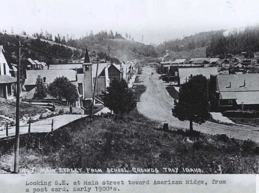 Toward American Ridge, from a postcard. Early 1900s. Wording on photo: 'No. 1 Main Street from School Grounds Troy, Idaho'.