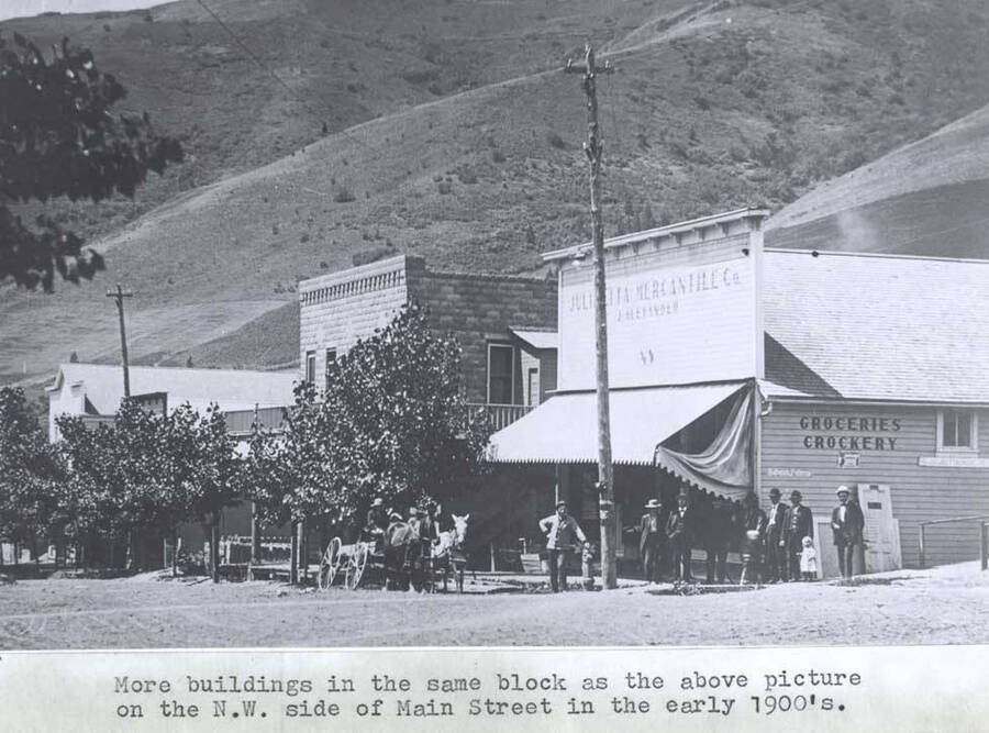 As the above picture [90-4-072] on the northwest side of Main Street in the early 1900s.