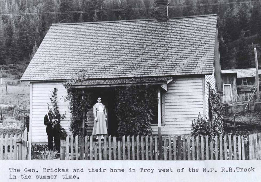 George Brickas and their home in Troy west of the N.P.R.R. [Northern Pacific Railroad] track in the summer time.