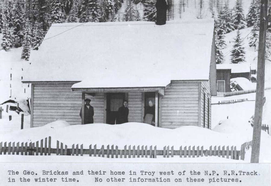 George Brickas and their home in Troy west of the N.P.R.R. [Northern Pacific Railroad] track in the winter time. No other information on these pictures.