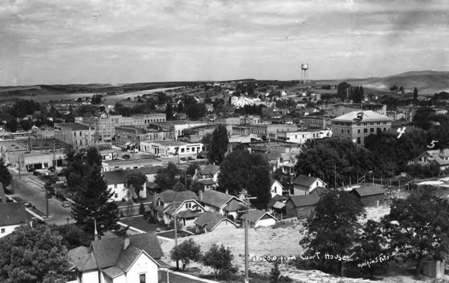 Looking northwest from the Courthouse. No. 1, Korter Creamery, located northwest corner of Fourth and Washington streets. No. 2, Albert's residence. No. 3, Post office. No. 4, Christian Church. No. 5, Dr. Asbury residence. Picture in the 1930s by Hodgins.