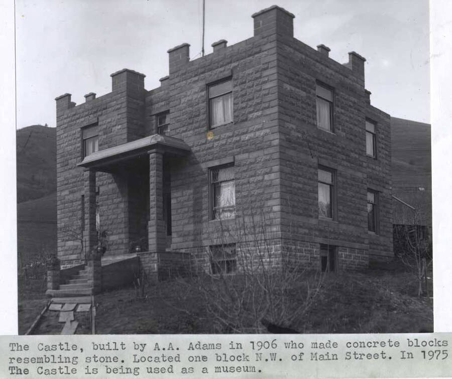 Built by A.A. Adams in 1906 who made concrete blocks resembling stone. Located one block northwest of Main Street. In 1975 'The Castle' is being used as a museum.