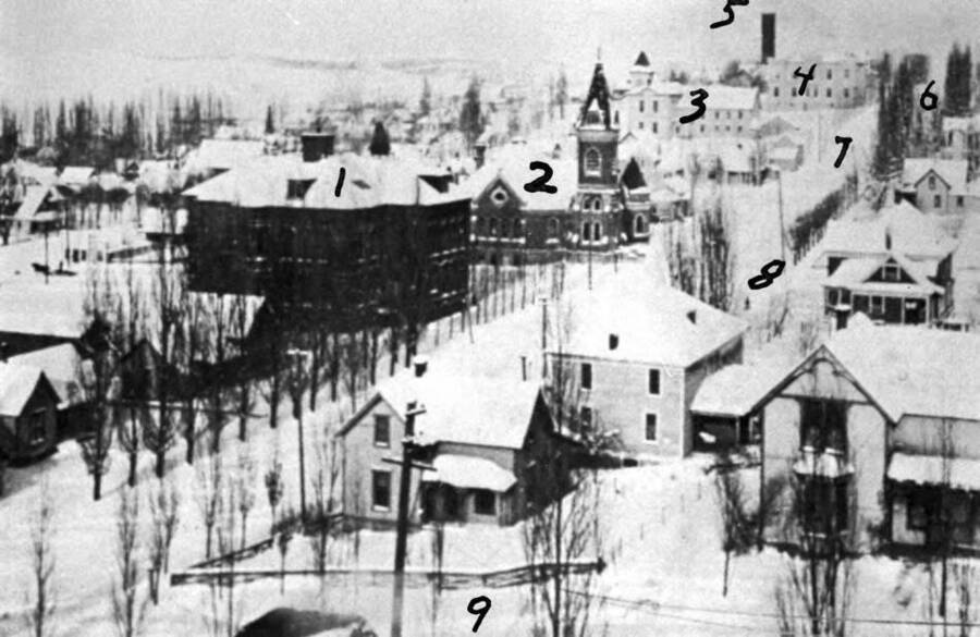 Looking northwest from first Courthouse in 1910-11. 1- Moscow's first high school, 2- Methodist Church, 3- Russell School, 4- Irving School, 5- Standpipe (water tank), 6- McConnell Mansion, 7- Adams Street, 8- Third Street, 9- Fourth Street. Picture from top of Courthouse.