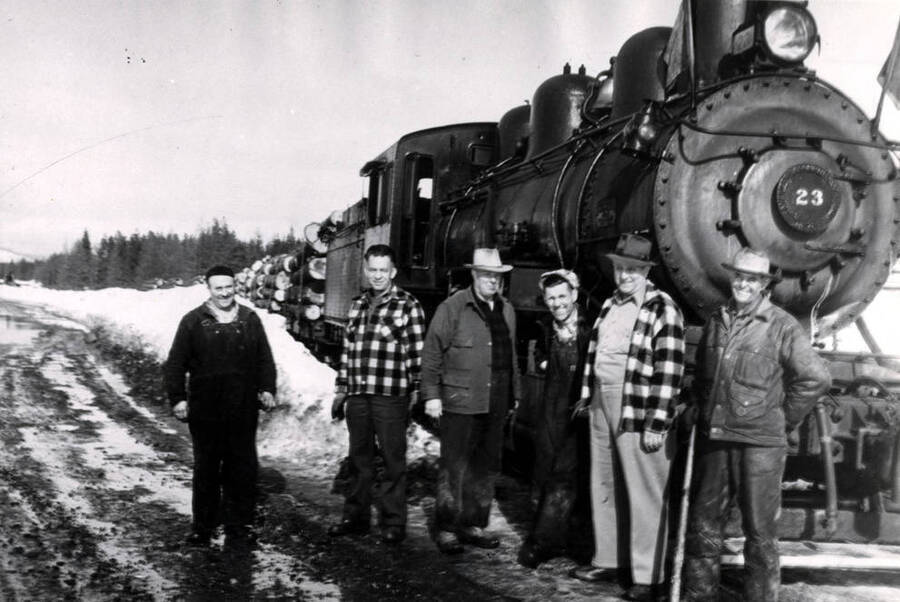 Engine number 23 and crew pose for a photo before their last run. Left to right: Byers Sanders, John Zagelow, Les Malboy, Kenneth White,  Alex Anderson and C. Hays.