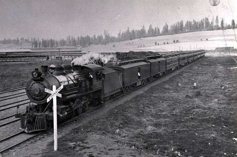 Front end of the passenger train in the W.I.&M. [Washington, Idaho & Montana Railway] yards carrying the honorary commercial commissioners of Japan on a tour of the Potlatch Lumber Company mill about 1913.