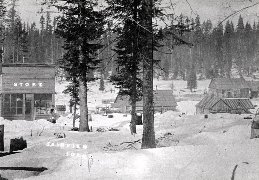 Showing the store and post office during a severe winter with lots of snow. Name was later changed to Slabtown as [southern] Idaho already had a Fairview registered with the U.S. Postal Department. It was located about two miles north of Bovill.
