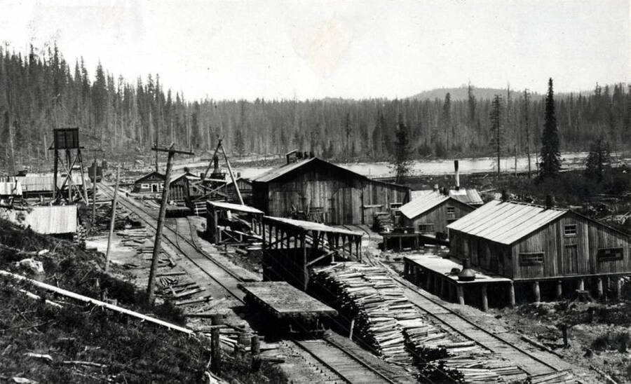 On the Milwaukee Railroad two miles north of Bovill. Shops are in the foreground with Slabtown in the background.
