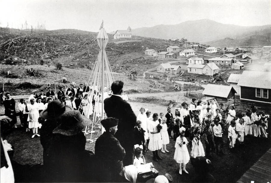 At the Elk River school. Catholic Church on hilltop in center of picture. 1920.