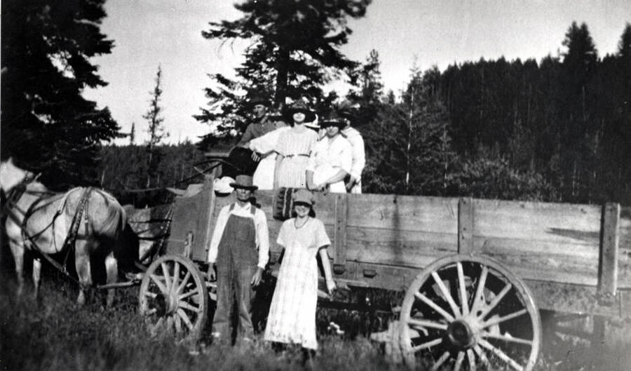 Typical farm wagon with side boards pulled by two horses from the Naylor farm. People not identified. About 1930.