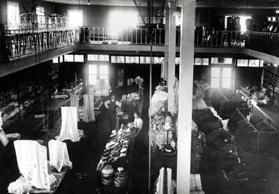 Williamson's first store at the northeast corner of Fifth and Main streets. Inside of store looking towards the front about 1904.