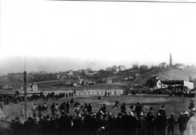 Athletic field was located on the west side of Main between D and E streets. Looking southeast at the corner of Main and D streets.