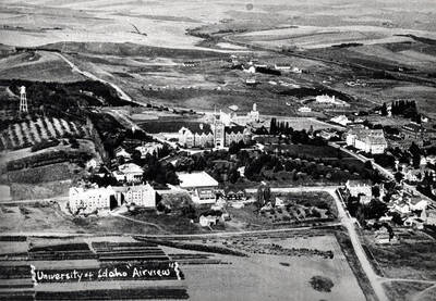 Looking west at University of Idaho buildings after 1926 or early 1930s. Picture predates the above [90-8-040] picture as Neale Stadium was not built at this time. Picture by Hodgins.