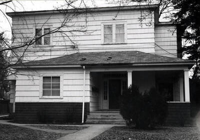 Barton residence remodeled into an apartment house at 310 North Van Buren Street. Looking at the west end of house in this picture and the south side of the south in top picture [90-7-049]. Picture by Clifford M. Ott, February 10, 1976.