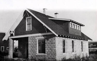 [House] at the southwest corner of Spotswood and Jefferson streets built by Wylie A. Lauder in the early 1900s. Lauder concrete block plant was located just west at the southeast corner of Spotswood and Washington streets. Picture taken in the 1930s. House still occupied 1982.
