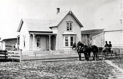 Henry Dernham, early Moscow merchant, and Dr. Henry B. Blake, Moscow's first doctor. Picture 1880. Location of house not known.