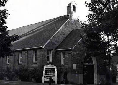 Front of the First Baptist Church at the southeast corner of First and Jackson streets. Picture by Hodgins's Drug Store, September 10, 1946.