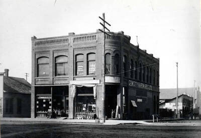 Located at southeast corner of Fourth and Jackson streets, west of the Skattaboe Building [,which is in the foreground of this photo.]