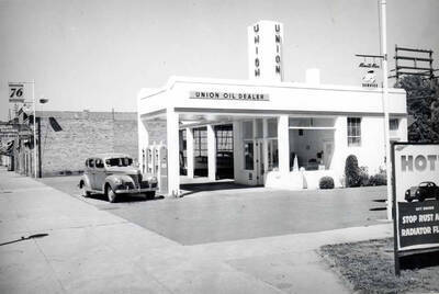 Northeast corner of Seventh and Main streets. In the 1930s. Next building at left was Nelson's Auto Electric operated by Herb Nelson for many years.