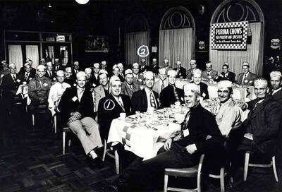 Purina school at Baker, Oregon. 1- Lyle Smith, Purina salesman for the Palouse area; 2- Clifford M. Ott, manager, Washburn's Farm Store.