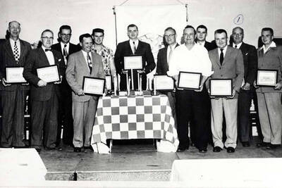 Salesmanship awards presented to the Purina Store managers or salesmen for completing training school, Spokane, Washington 1956. 1- Clifford M. Ott.