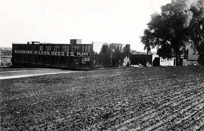 Plant #2 was purchased in 1943 and required reconditioning of roofs, fire walls, and a complete east end. Three-story east send of the building had barley pearling equipment installed. Rest of the building was used for storing 100-pound sacked beans and held many carloads. Washburn name is [on] the east end of the building. Building originally was used in the manufacturing of furniture.