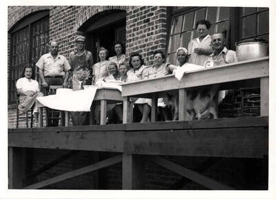 Summer of 1943. Back row, left to right?: Alice Shooter, office; C.M. Ott, mgr; Erwin Williams, machinery. Other man is George Hoffman, "pkg man."