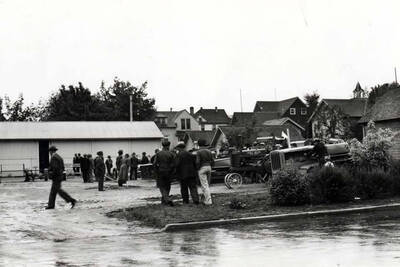 Equipment for harvesting peas and lentils on display in Washburn-Wilson parking lot by Moscow implement dealers, Farmers Day, June 19, 1937.