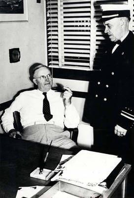 Herman N. Wilson, manager, Washburn-Wilson Seed Company, and Carl Smith, fire chief of the Moscow Volunteer Fire Department many years.