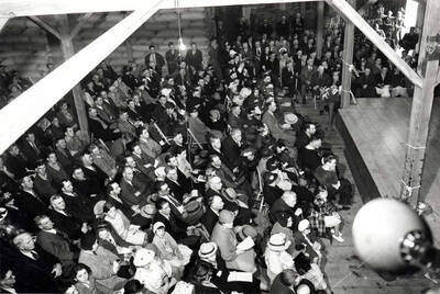 Farmers Day meetings were held for many years by the Washburn-Wilson Seed Company for their many pea and lentil growers and others interested. Above [90-11-027] picture was taken in their warehouse at Almon and A streets June 19, 1937, by Charles Dimond of Hodgins.