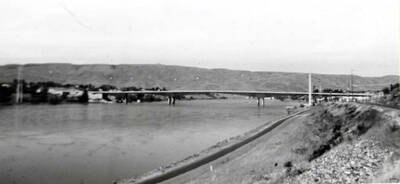Looking north at the new interstate bridge across the Snake River. Approach at the Clarkston end of the bridge was not completed when the picture was taken May 21, 1982, by Clifford M. Ott on a color slide using a wide angle lense.