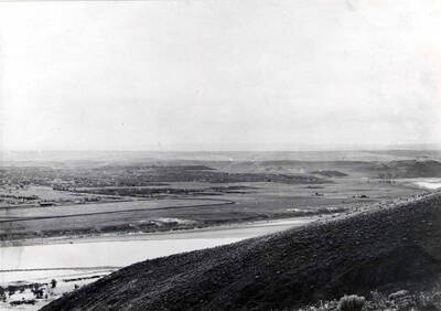 Part III. Copies of a three section original picture of Lewiston and Clarkston given to Toni Earl of the Luna House (museum) at Lewiston by Charles Kipp, Kooskia, Idaho. Picture taken by Henry Fair, a Lewiston photographer in 1907 before the arrival of the Oregon-Washington Railroad & Navigation Company. See picture 90-10-013 later in 1907.
