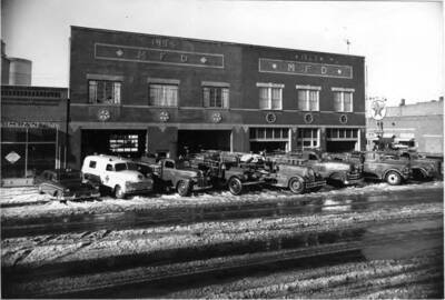Moscow Fire Department equipment in front of the fire station showing the new addition built in 1954.