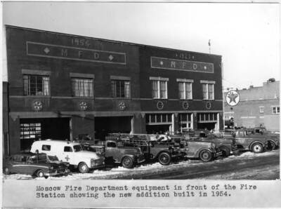 Moscow Fire Department equipment in front of the fire station showing the new addition built in 1954.