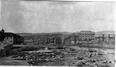 After the wreckage was nearly cleaned up. First gymnasium at left and Morrill Hall, still incomplete far right in picture.