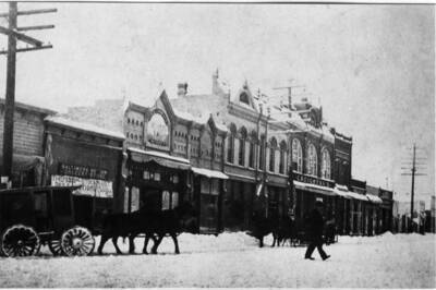 Swan's (sic) grocery delivery wagon in foreground. Picture taken 1910-11.