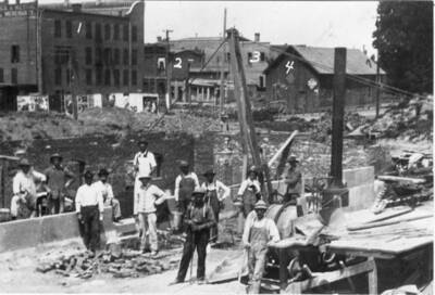 (Post office) May 1910. Located on the east side of Washington Street between Second and Third streets. 1- W.J. McConnell Building, 2- White Building, 3- Elks Temple, 4- Pioneer theater building burned after 1910-11.