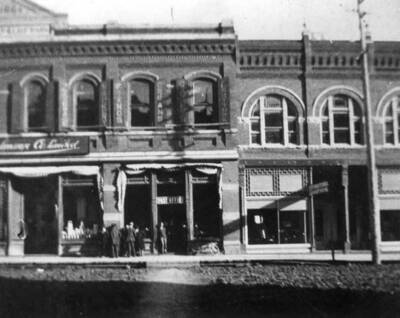 The building at right McCartor Block. Built in 1891, occupied by Grice (furniture and undertaking).