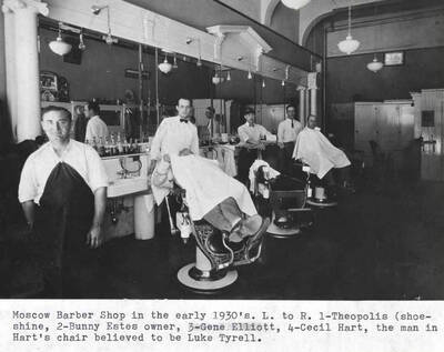 In the early 1930s. Left to right: 1- Theopolis (shoe-shine). 2- Bunny Estes, owner. 3- Gene Elliott. 4- Cecil Hart. Man in Hart's chair believed to be Luke Tyrell.