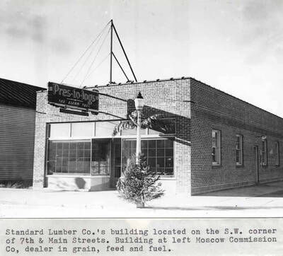 Located on the southwest corner of Seventh and Main streets. Building at left Moscow Commission Company, dealer in grain, feed and fuel.