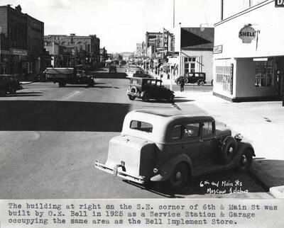 Building at right on the southeast corner of Sixth and Main streets was built by O.E. Bell in 1925 as a service station and garage occupying the same area as the Bell Implement Store. Moscow.