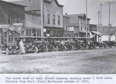 Showing model T Ford cars. Picture from Herb (Tiny) Mortinson album of 1912.