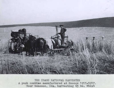 A push combine manufactured at Moscow 1911-1917. Near Genesee, Idaho. harvesting 65 bushel wheat.