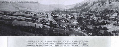 Copied from a foldout postcard. Picture taken after the three preceeding pictures [90-4-067, 068, 069]. Believed to be in the early 1900s. Wording on photo: 'Bird's-eye View of Juliaetta, Idaho, looking east.'