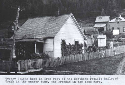 West of the Northern Pacific Railroad track in the summer time. Brinkas (sic) in the back yard.