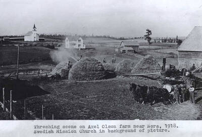 On Axel Olson farm near Nora, 1918. Swedish Mission Church in background of picture.