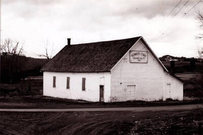 Old Timer - The Kennedy Ford Grange hall, home of Kennedy Ford Grange 177, a member of the Idaho State Grange association, is the oldest Grange in Idaho in continuous operation. It was organized in 1906 with 99 charter members. The hall was recently dedicated with a well-attended program. The hall is located between Palouse and Potlatch, near the Potlatch-Moscow junction. [Caption from newspaper photo?]
