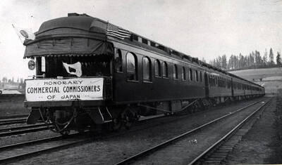 In the W.I.&M. [Washington, Idaho & Montana Railway] yards at Potlatch carrying the honorary commercial commissioners of Japan on a tour of the Potlatch Lumber Company mill about 1913.