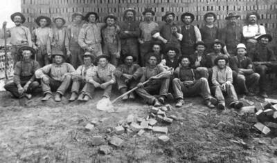 Left to right: Wiley Lauder with arms folded, 7th, Tom Taylor with tie, vest and watch chain, 10th man standing.